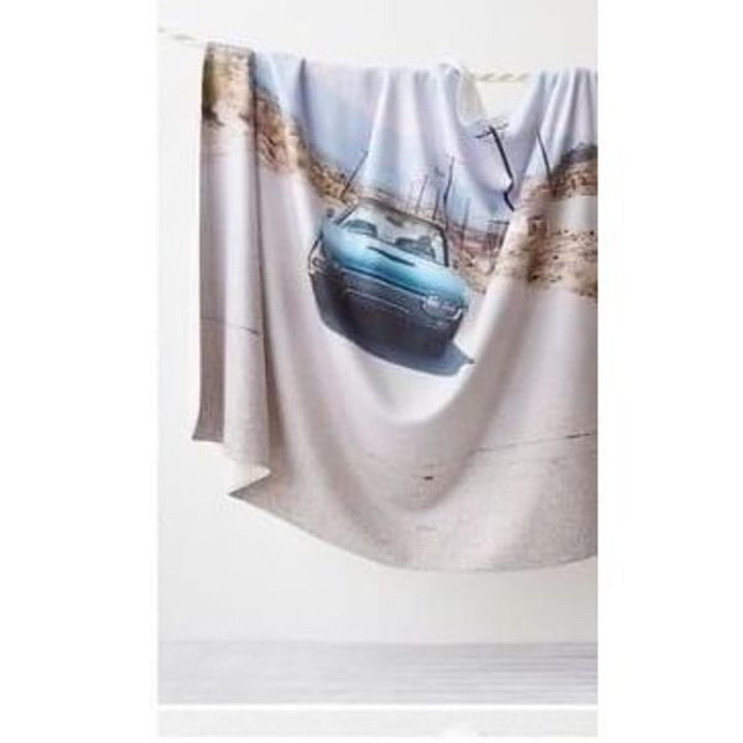 An FP exclusive with Ri-Ri-Ku Free People Landscape sheep blanket  $165