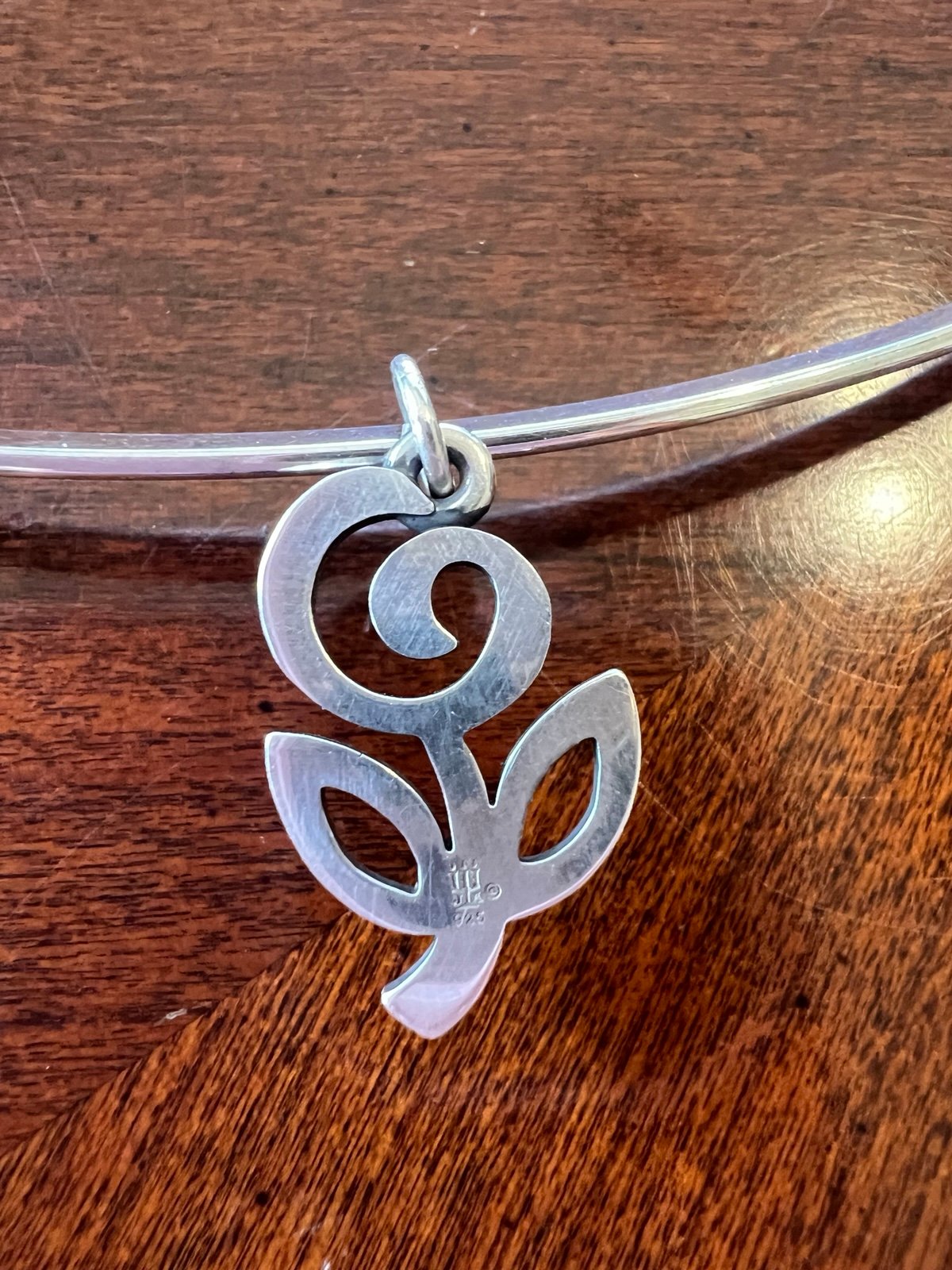 Retired James Avery flower pendant/charm