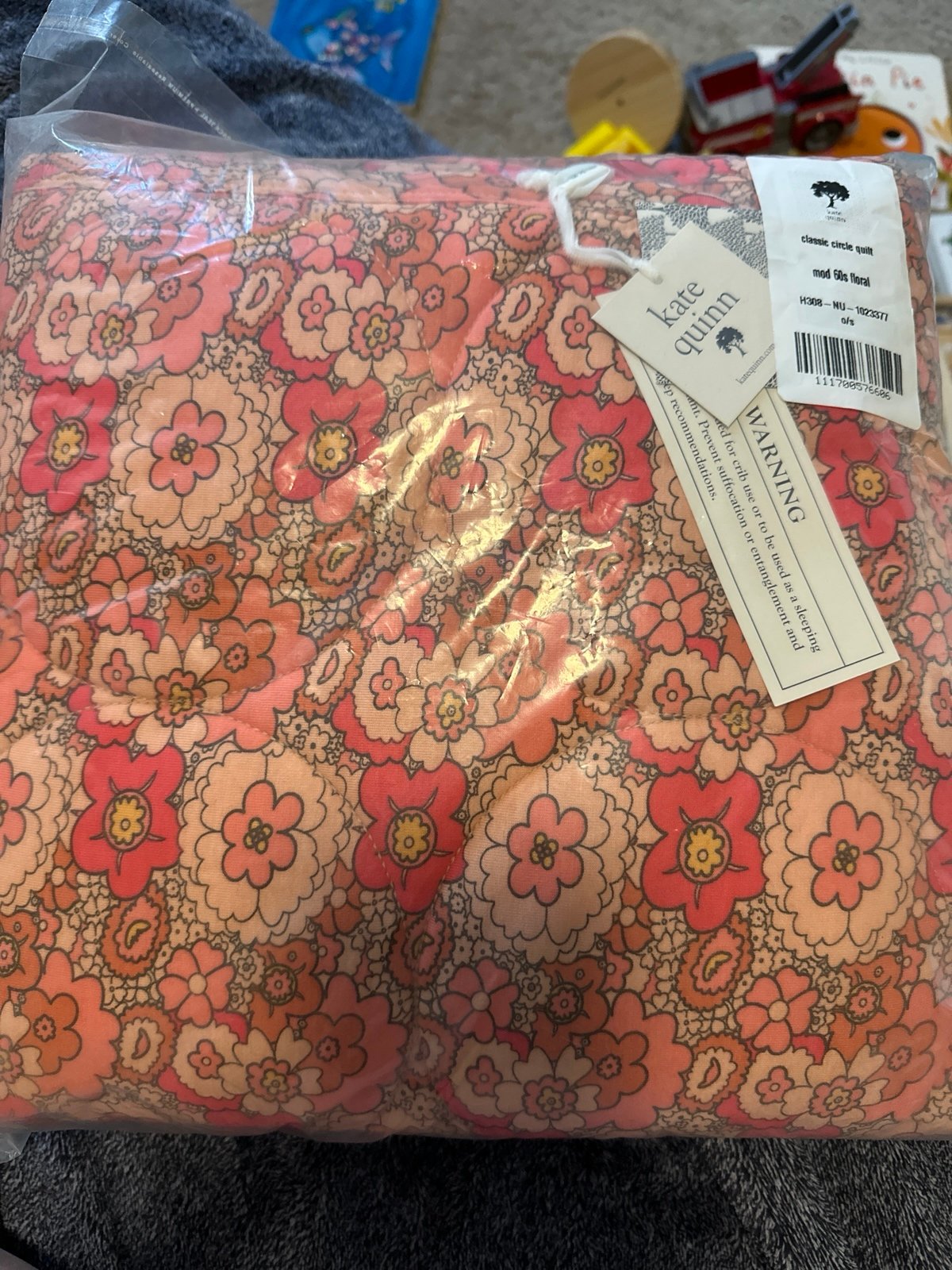 Kate Quinn mod floral quilt