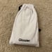 Glossier DC luggage tag