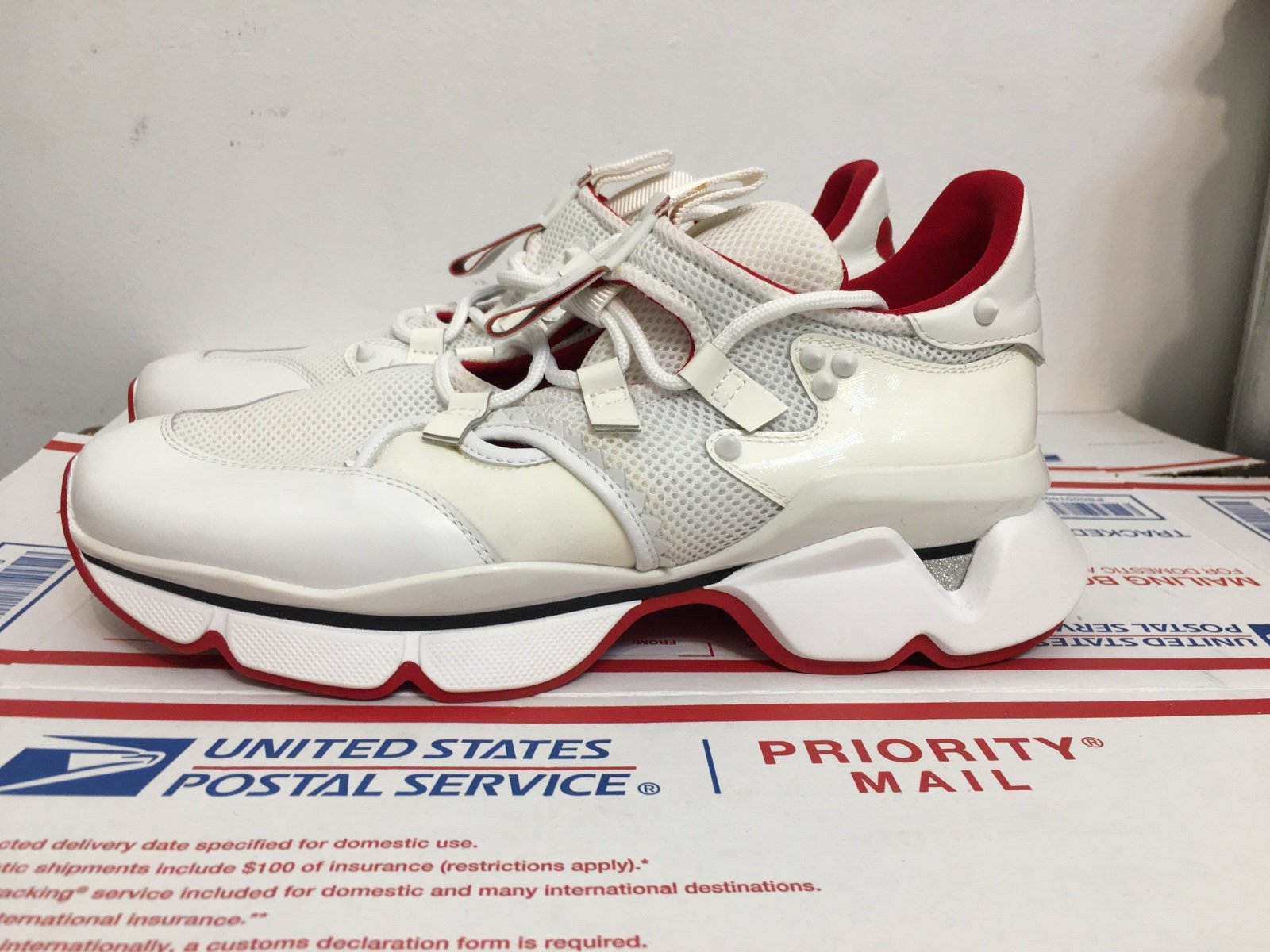 Christian Louboutin Paris Red Runner White Sneakers. new without box Size 38.5
