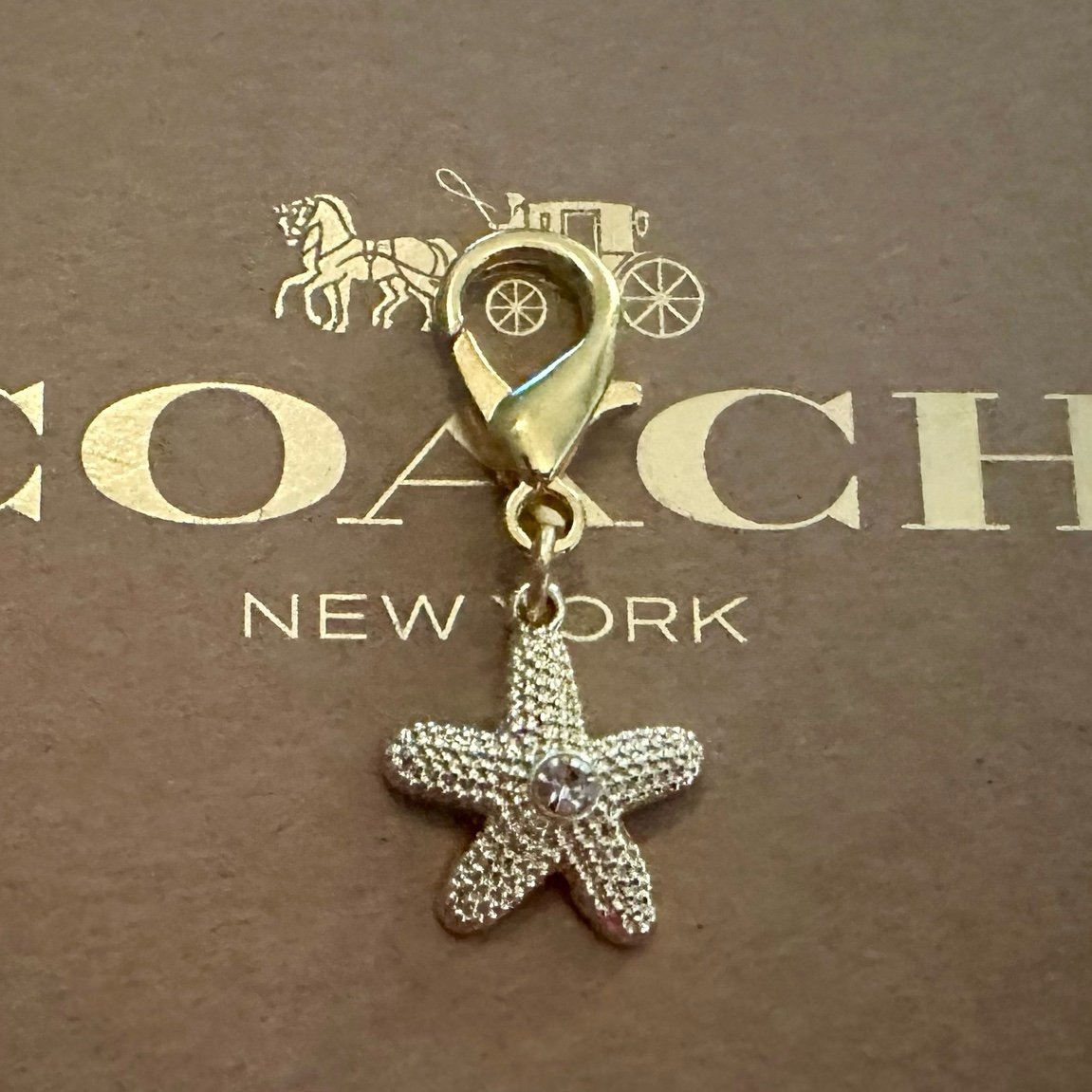 Coach Textured Crystal Starfish Wristlet Bag Charm Gold-tone