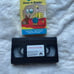 Curious George Book, VHS Tape, Paper sheets, Activity Booklet