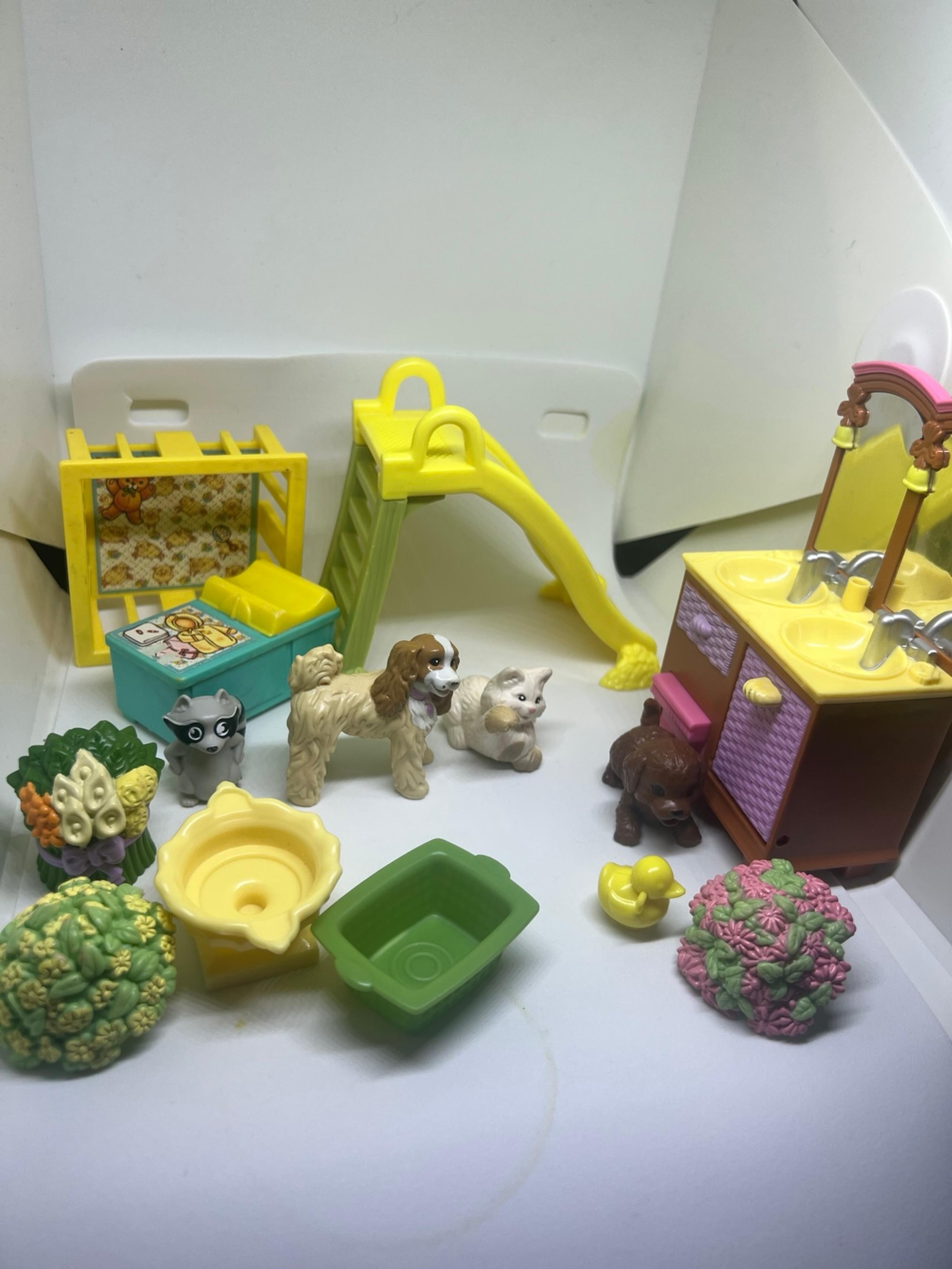 Vintage Fisher-Price, loving family, random cat dogs, raccoon flower crib vanity