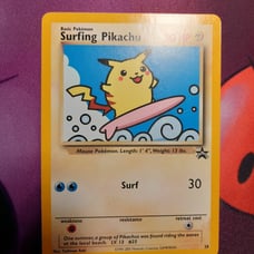 surfing pikachu black star 28 near mint