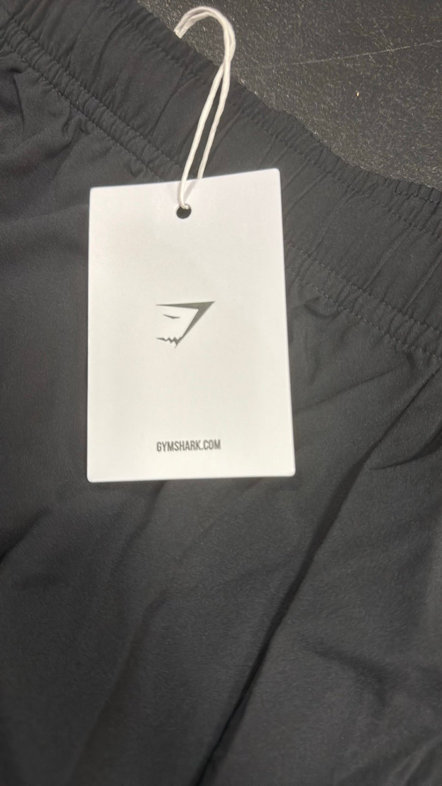 men’s size large gym shark shorts, brand new with tags