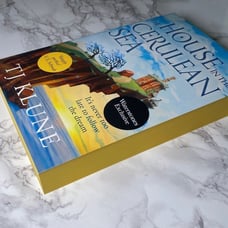 Waterstones Exclusive Edition: The House in the Cerulean Sea with Sprayed Edges