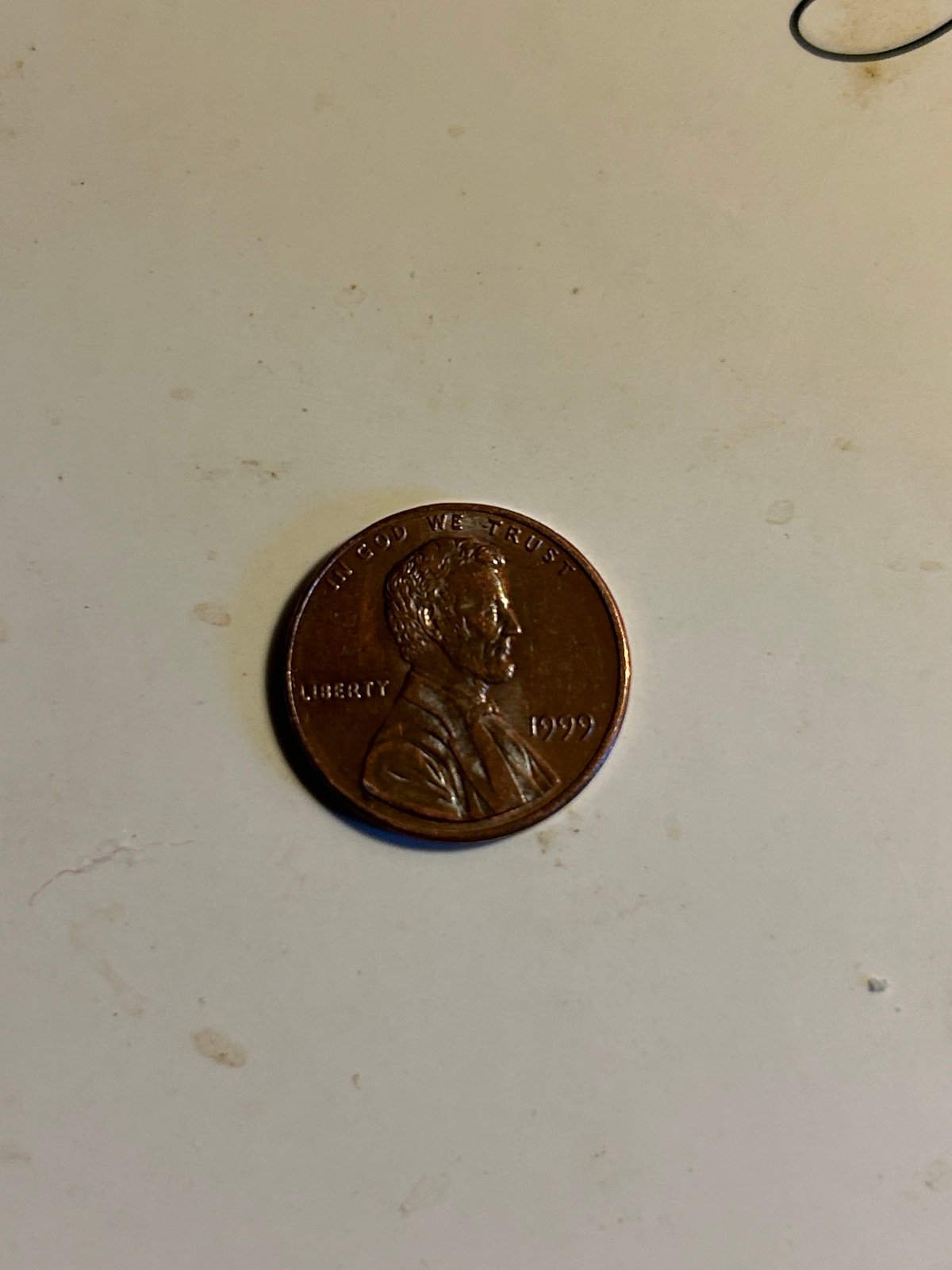 1999 penny close AM no mint mark
