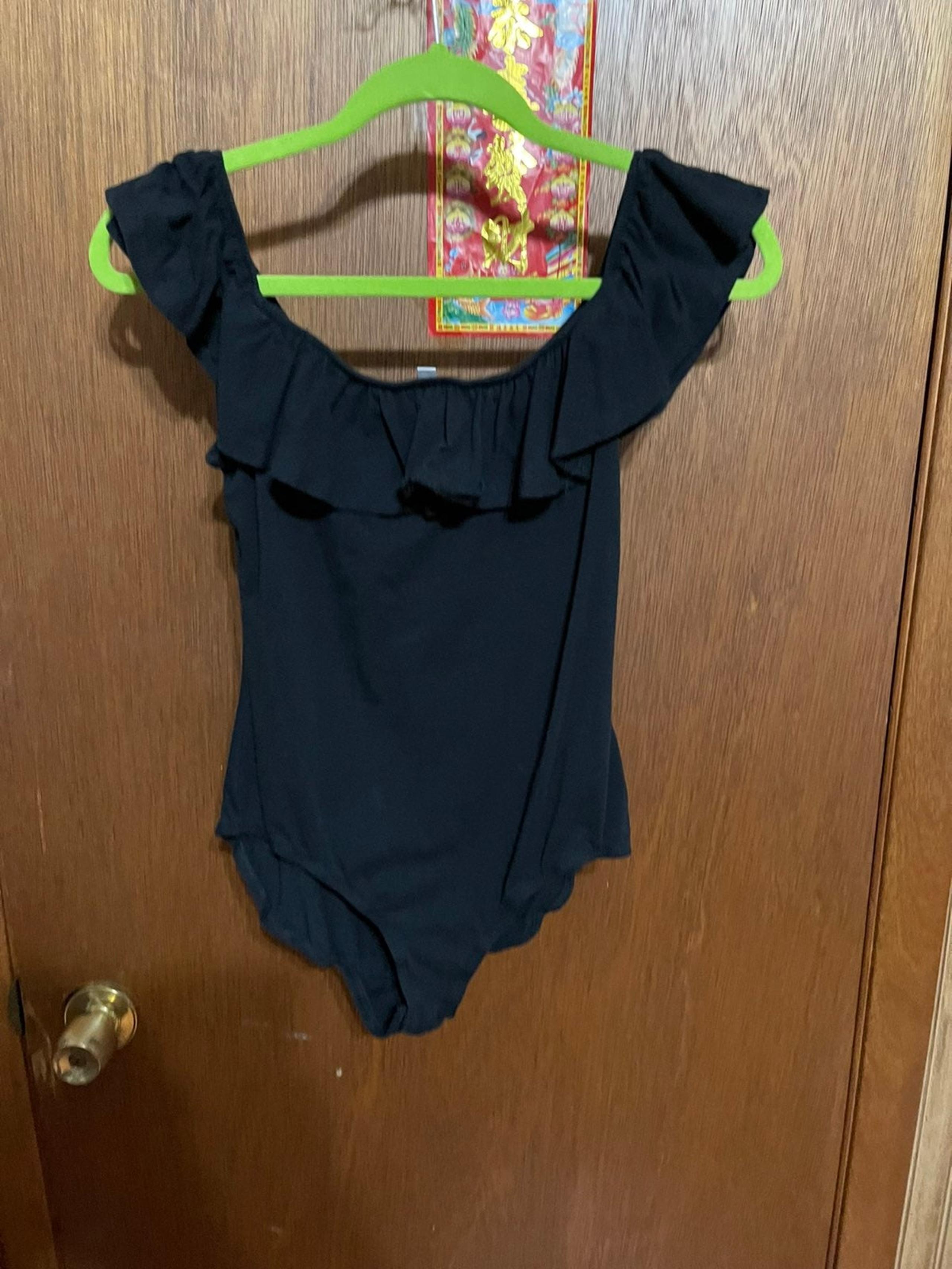 Black bodysuit with ruffles