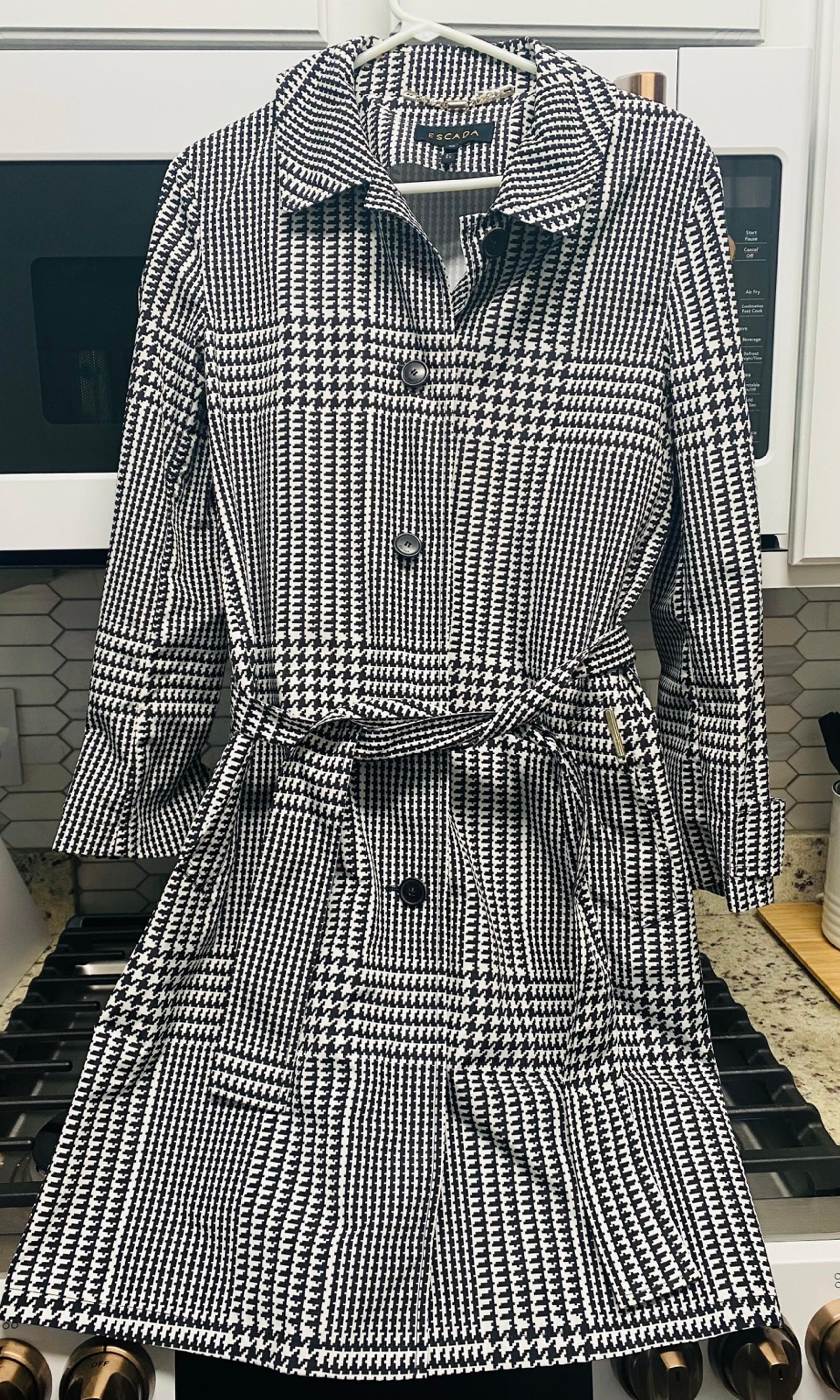 Escada jacket with pockets and an inside pocket.