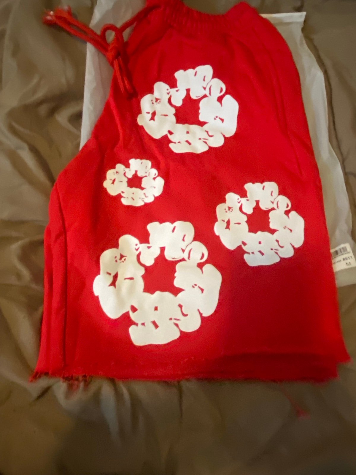 Red denim tears shorts