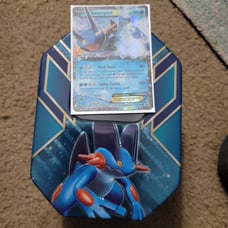 2015 Pokemon tin with cards