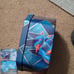 2015 Pokemon tin with cards