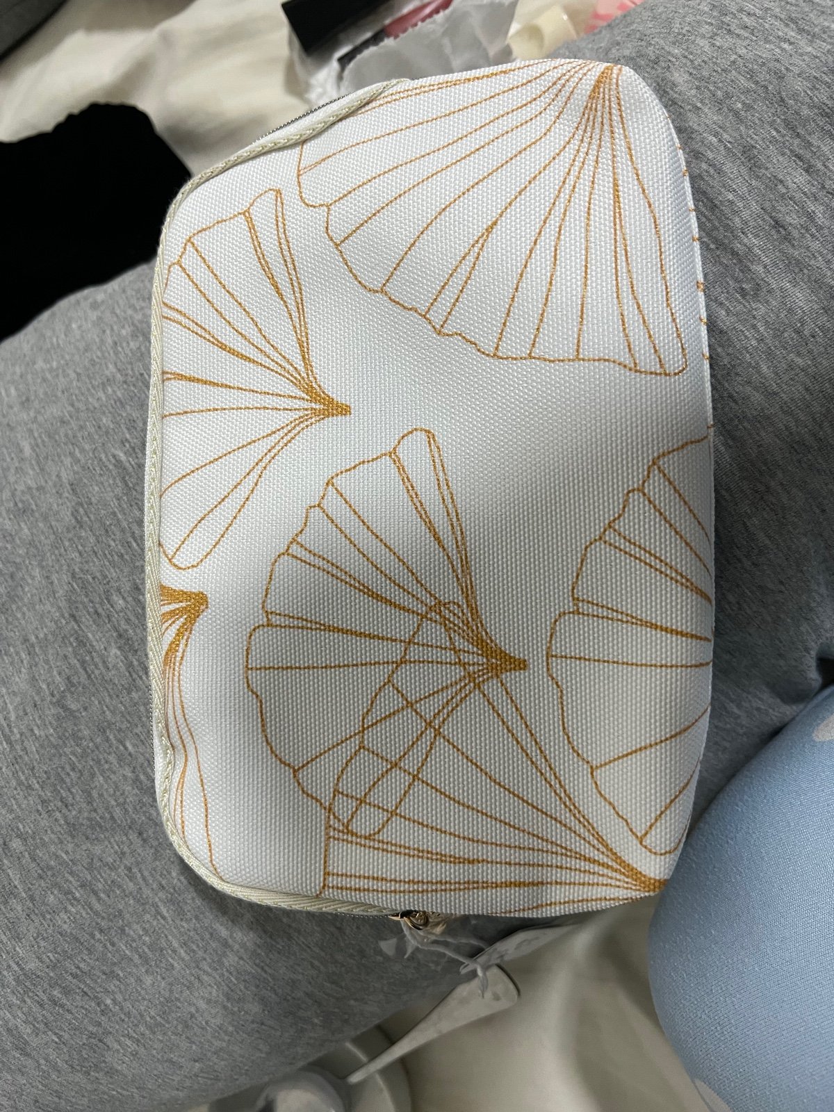 New with tags Sisley makeup bag / cosmetics bag with gold colored hardware. Zipp