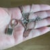 The Lock It Down Long silver necklace with lock and toggle closure