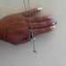 The Lock It Down Long silver necklace with lock and toggle closure