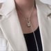 The Lock It Down Long silver necklace with lock and toggle closure