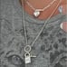 The Lock It Down Long silver necklace with lock and toggle closure