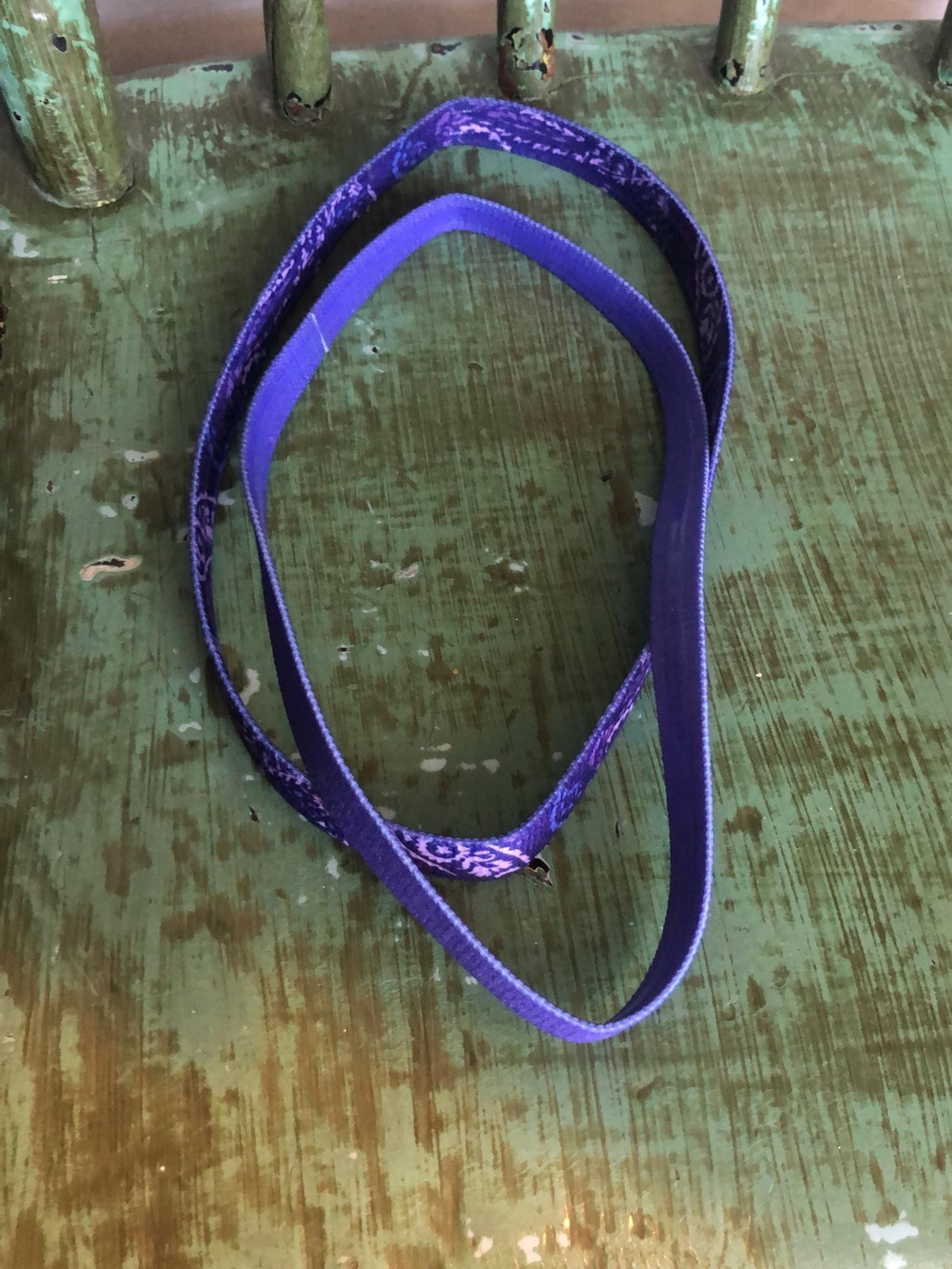 I’m selling two purple headbands