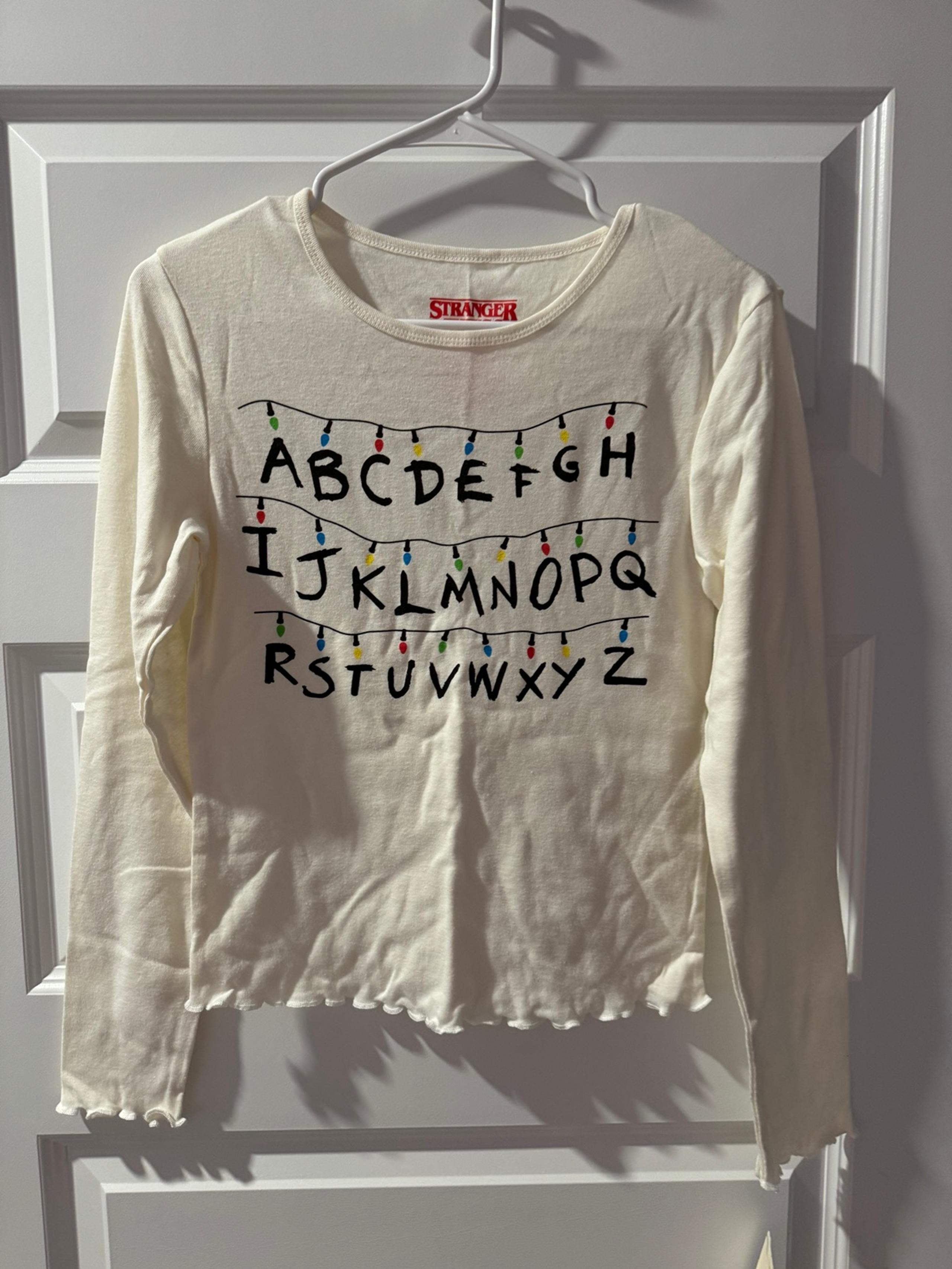 Stranger Things Alphabet Lights Netflix Women’s Ruffle Hem Long Sleeve T-Shirt