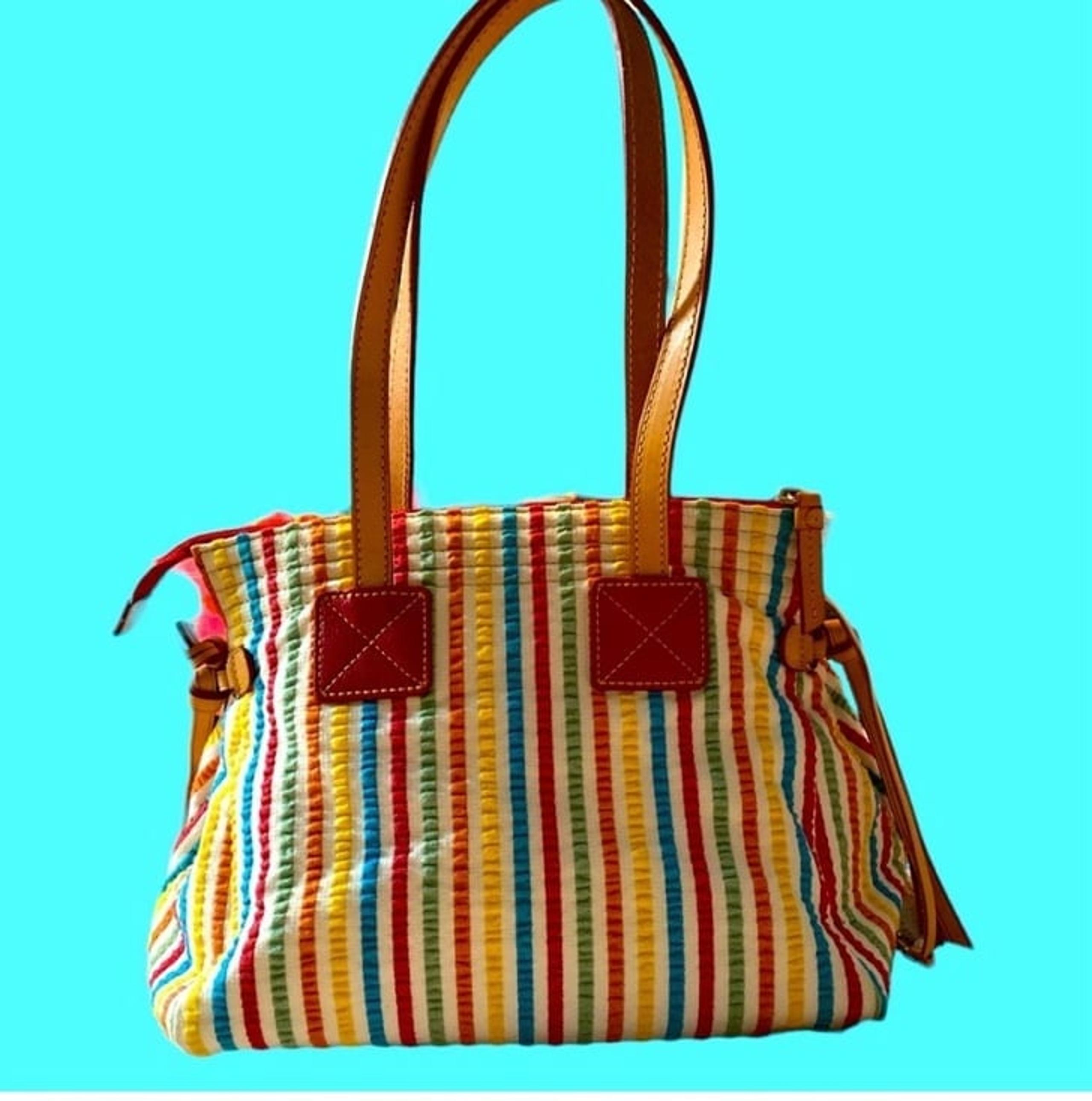 Dooney and Bourke multicolored striped seersucker satchel with tan leather strap
