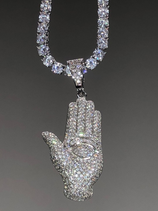 20 tennis chain Hamsa pendant set.