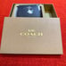 Coach small snap wallet with snowman print/silvertone hardware