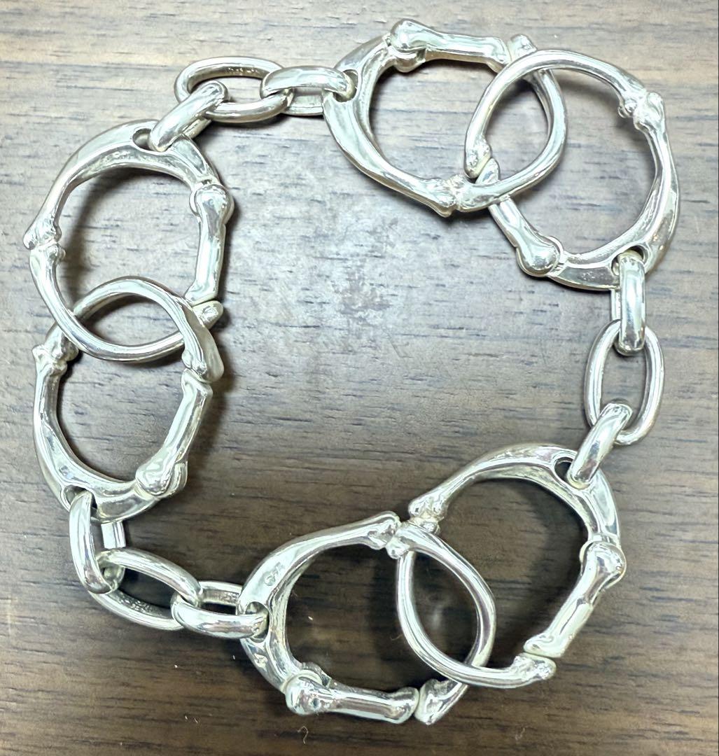TAKAHIROMIYASHITATheSoloist. bone shaped carabiner bracelet