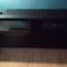 Entertainment center with glass shelf