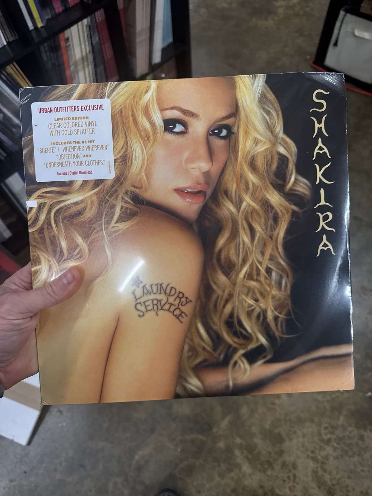 Shakira laundry service urban outfitters exclusive clear gold splatter