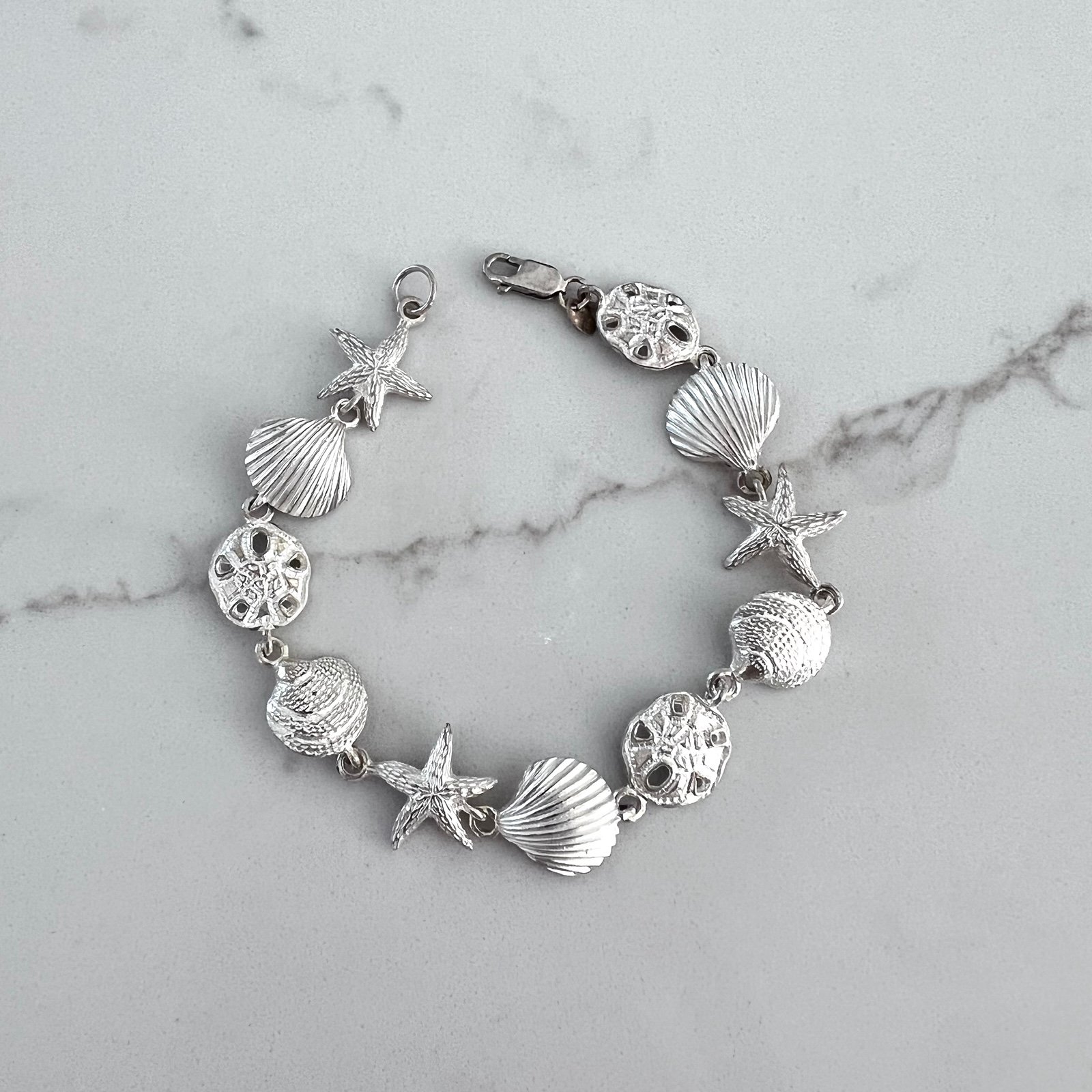 Sterling Sea shells Starfish bracelet 8” long