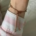 Women's Gold and White Watch
