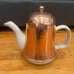 Vintage ceramic tea pot with insulated copper top in excellent condition