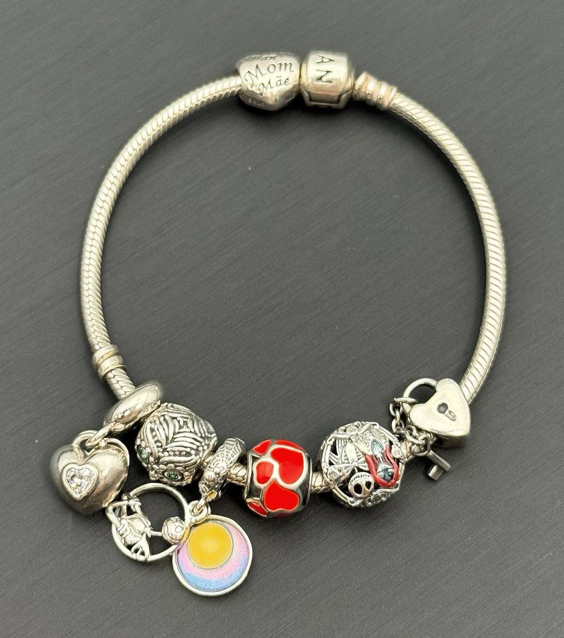 Jewelry Pandora 925 sterling silver gold 7.5” charm bracelet with 7 charms
