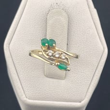 Vintage emerald and diamond bypass ring 14 karat yellow gold