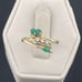 Vintage emerald and diamond bypass ring 14 karat yellow gold