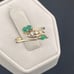 Vintage emerald and diamond bypass ring 14 karat yellow gold