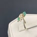 Vintage emerald and diamond bypass ring 14 karat yellow gold