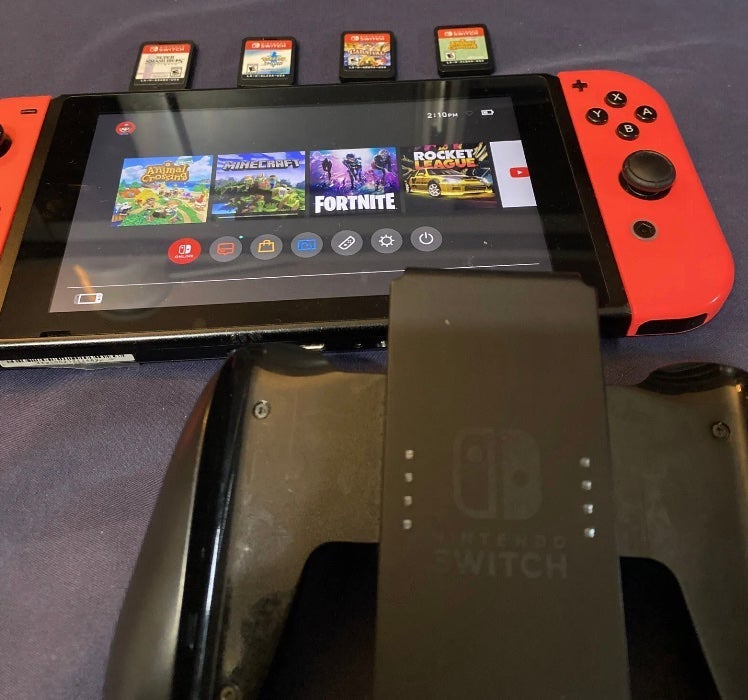Nintendo switch console w/ Case and 5 Games