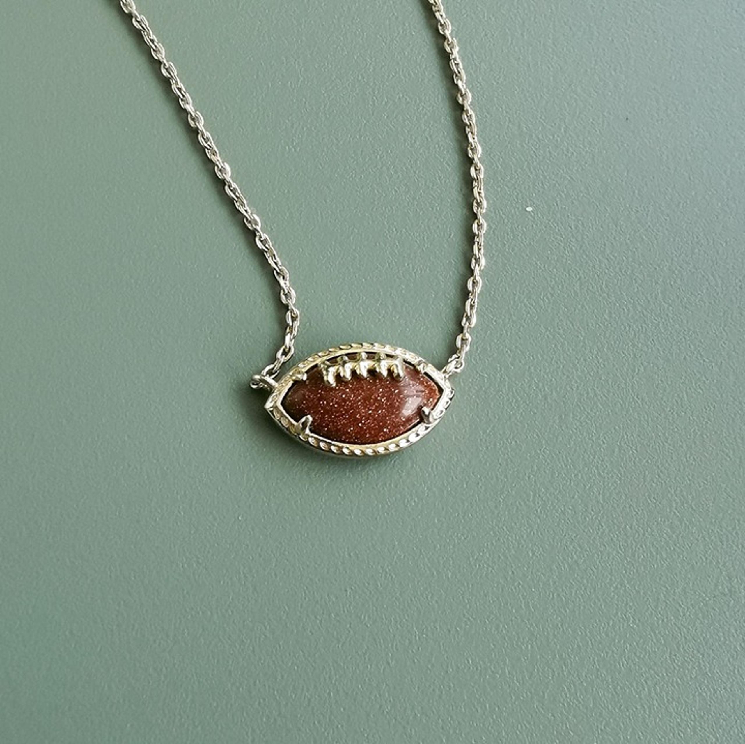 Kendra Scott Football Gold Orange Goldstone Short Necklace. NEW