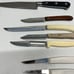 Lot of 9 kitchen knives. They all stainless steel. Made in USA. vintage.