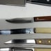 Lot of 9 kitchen knives. They all stainless steel. Made in USA. vintage.