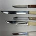 Lot of 9 kitchen knives. They all stainless steel. Made in USA. vintage.