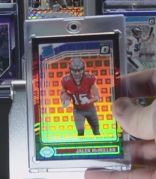 2024 Panini Optic Jalen McMillan Rated Rookie Black Pandora #/25