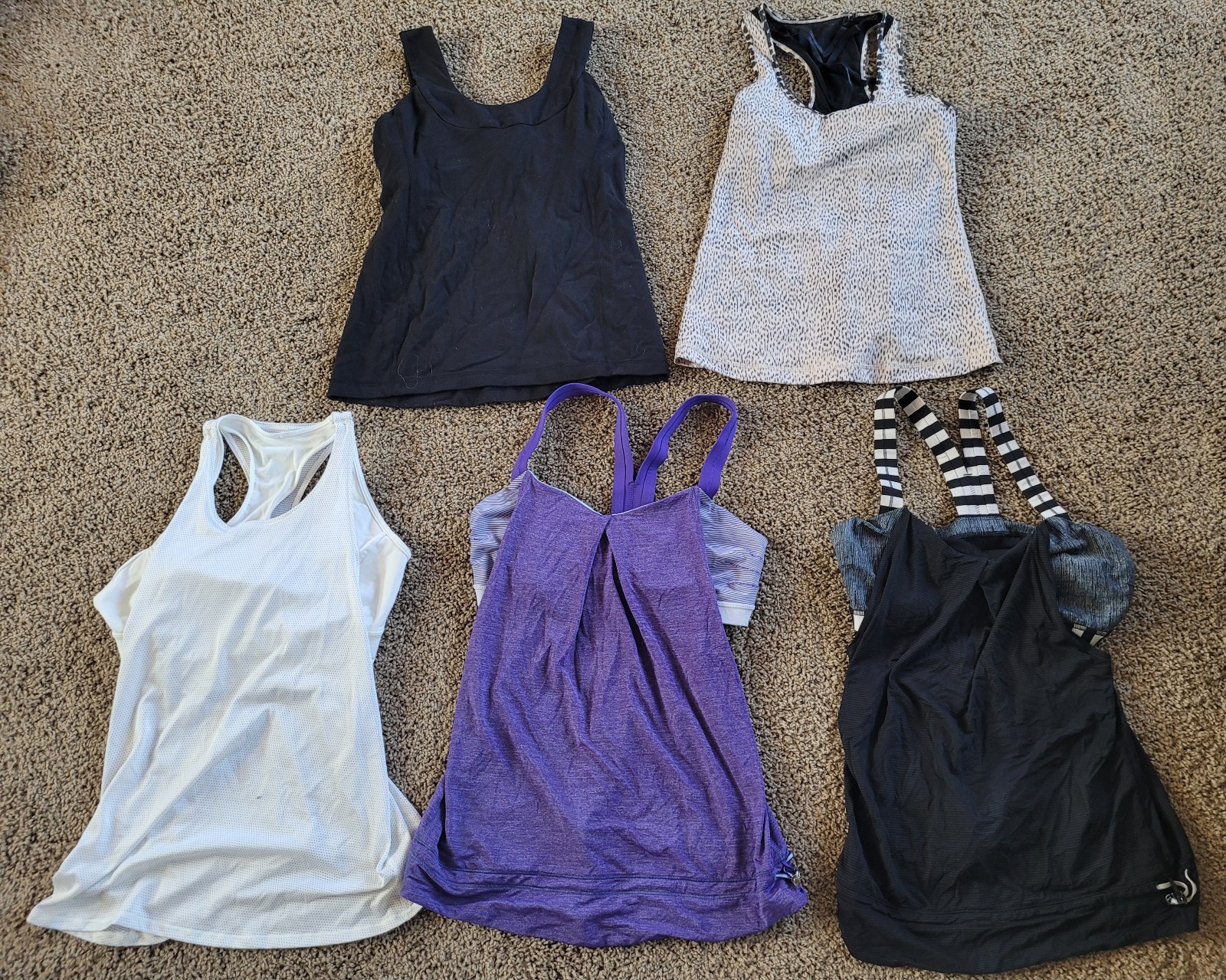 Lot of women's size 8 Lululemon athletic tank tops