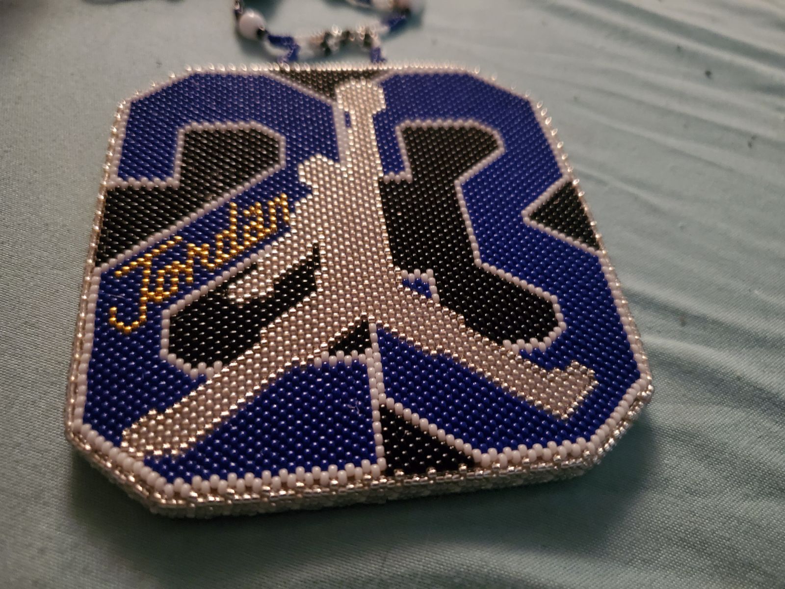 Handmade beaded jordan pendant