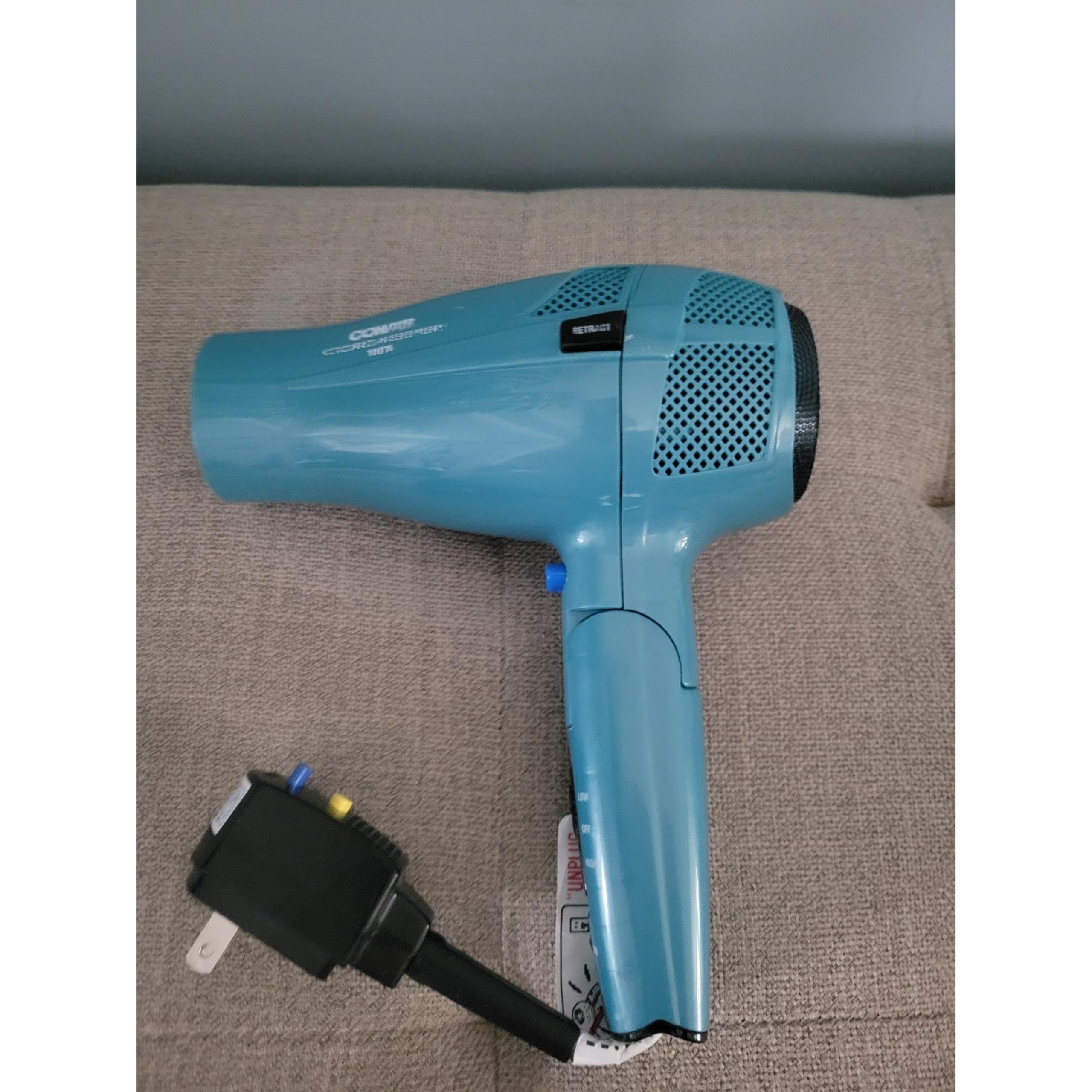 1875 Watt Cord Keeper Travel Hair Dryer-Folding Handle & Retracting Cord - Conair