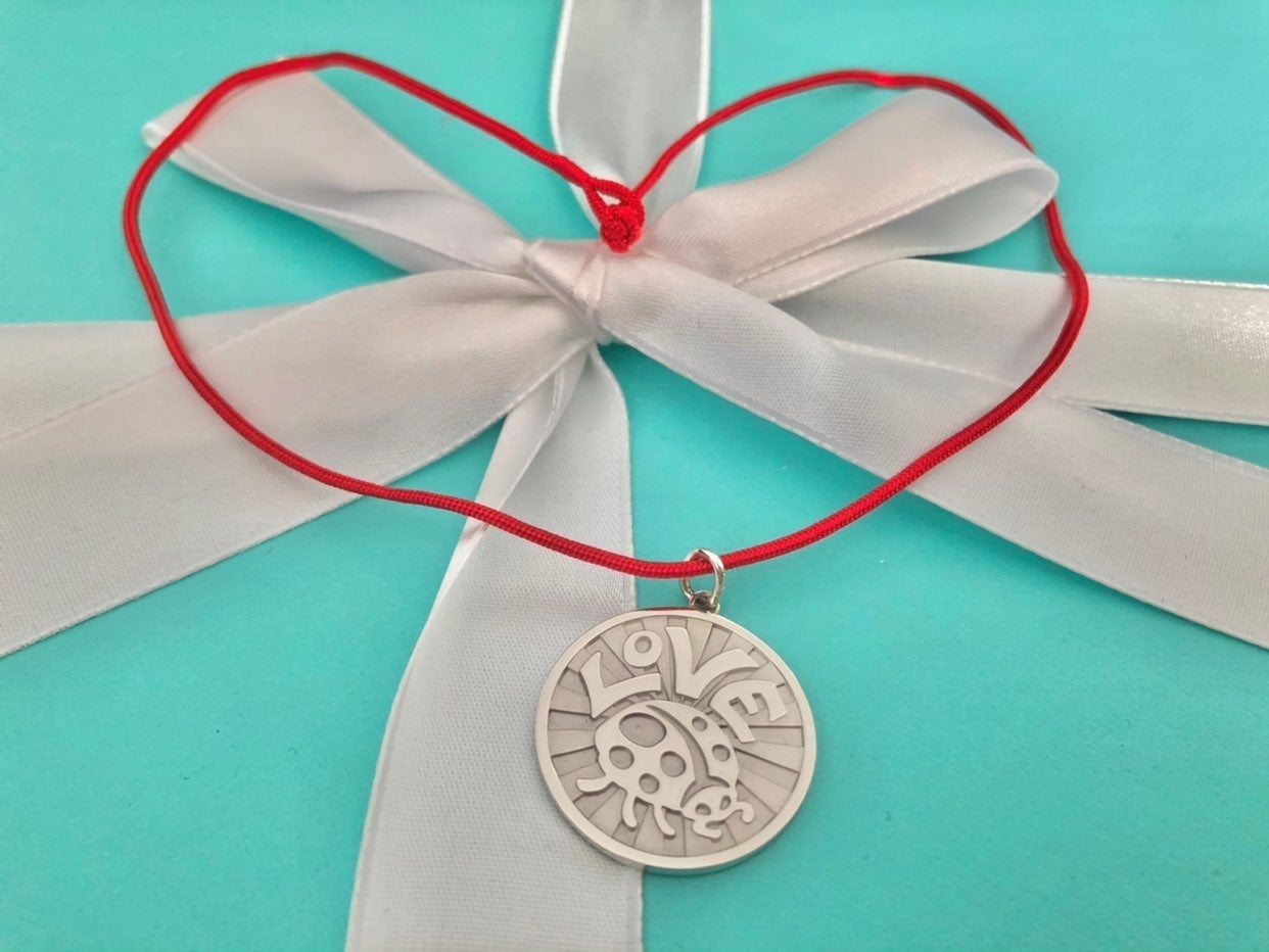 Tiffany love bug coin charm