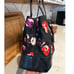 KATE SPADE black floral poppy print nylon patent leather satchel tote bow accent