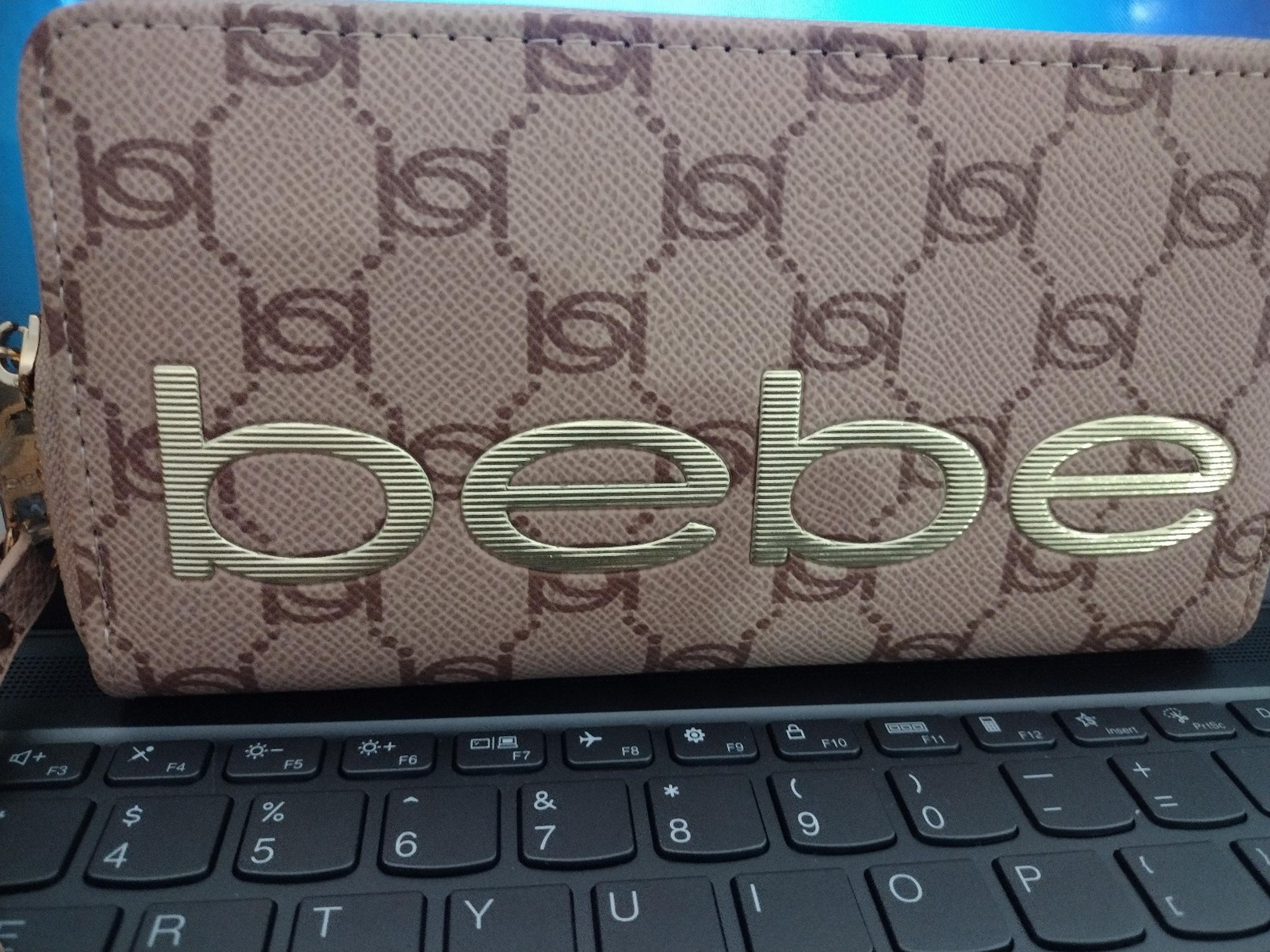 Bebe wristlet wallets for women